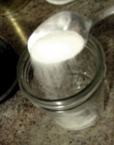 pouring-sugar-iced-coffee-mason-jar
