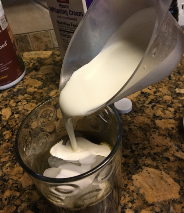 Pour heavy cream into ice/mocha mixture