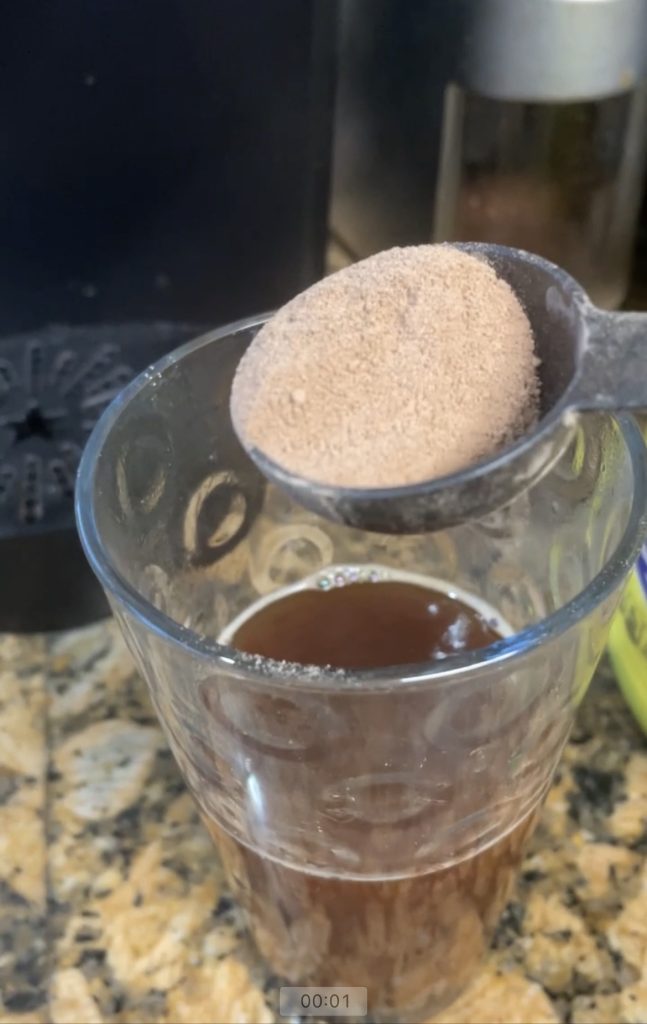 Use 1 or 2 tablespoons of nesquik to mix into the coffee